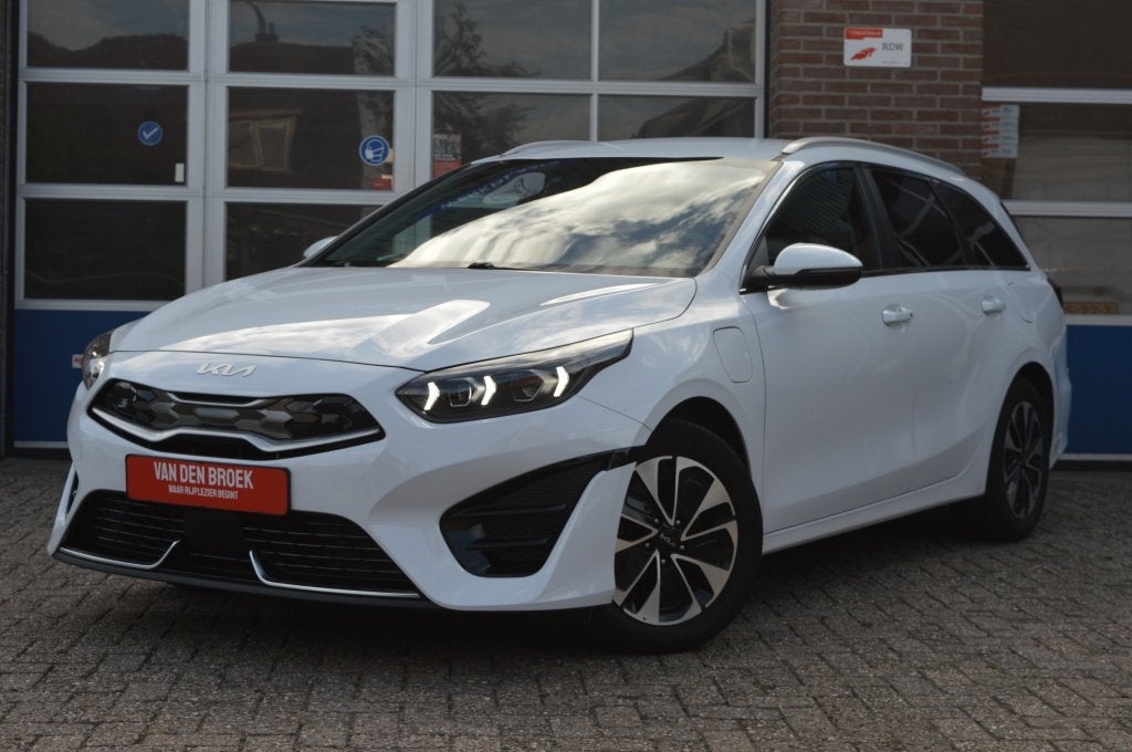 Kia Ceed Sportswagon 1.6 GDI PHEV | CAMERA - 1e EIG, Auto's, Kia, Automaat, Gebruikt, Leder en Stof, Wit