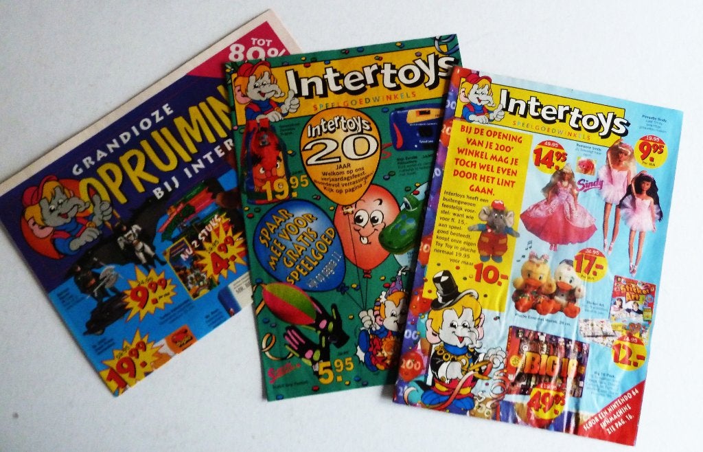 3 Folders Intertoys speelgoed jaren 1997, Ophalen of Verzenden, Gebruikt, Reclamebord