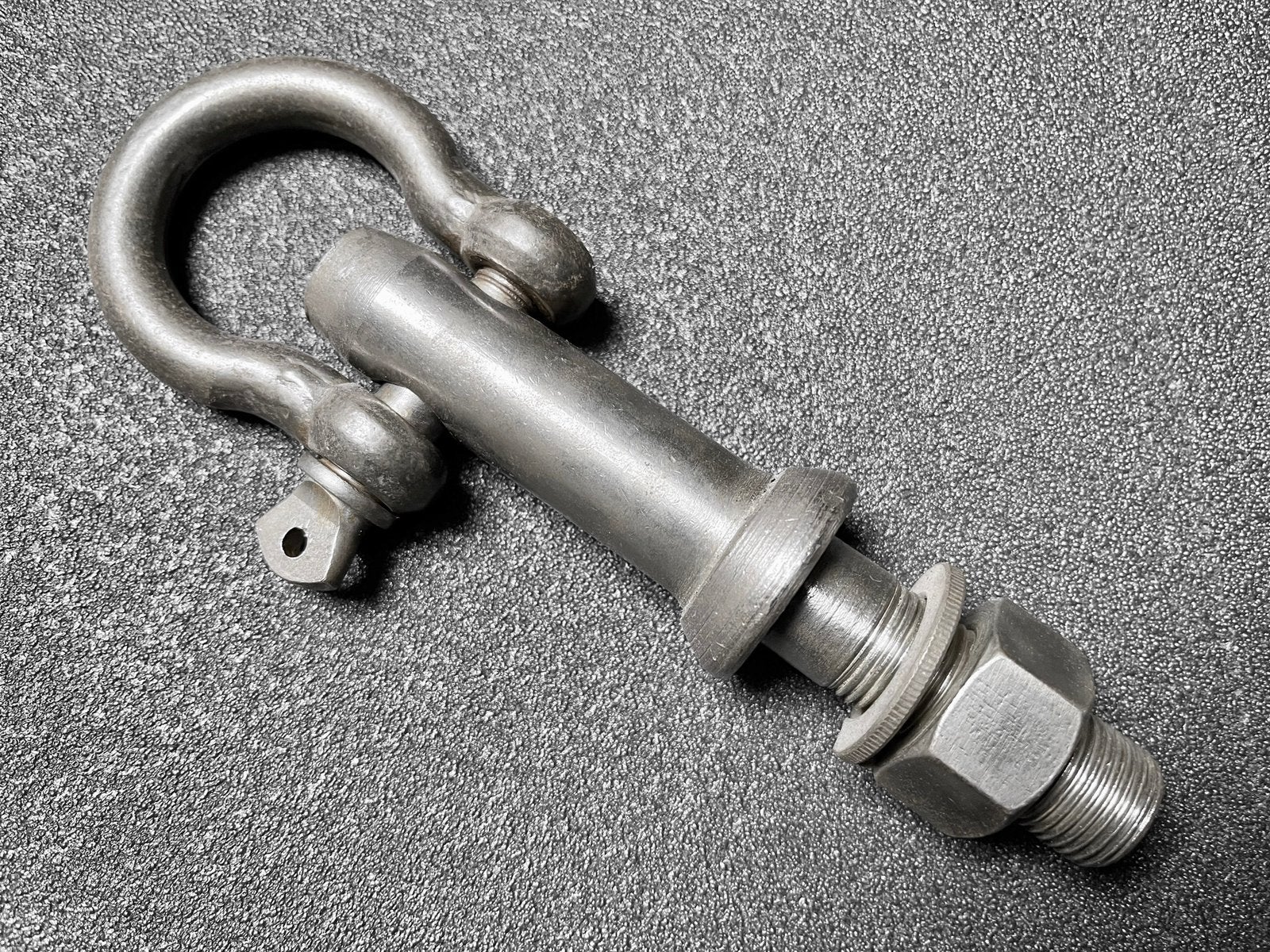 Werktuigpen met harpsluiting / sleepoog, Ophalen