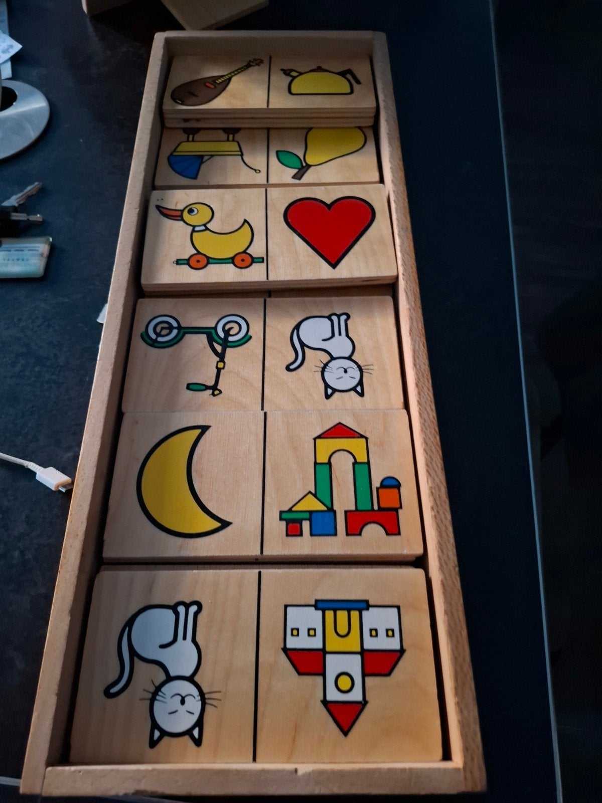 houten domino, Ophalen