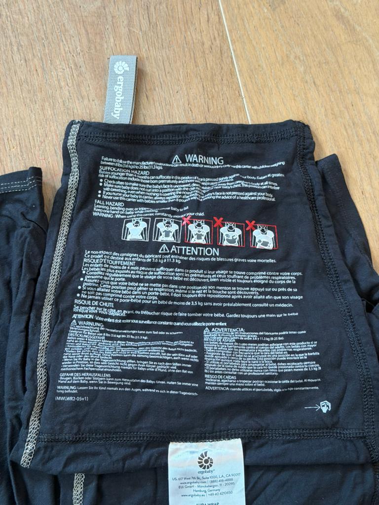 Ergobaby Aura Wrap Draagdoek - Pure Black, Kinderen en Baby's, Babydragers en Draagdoeken, Draagdoek, Zo goed als nieuw, Buik