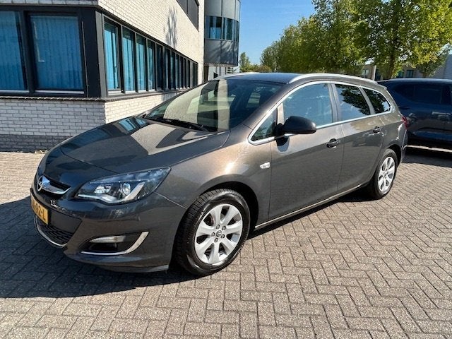 Opel Astra Sports Tourer 1.4 Turbo Sport + NAVI CRUISE CLIMA, Stof, Gebruikt, Euro 6, 4 cilinders
