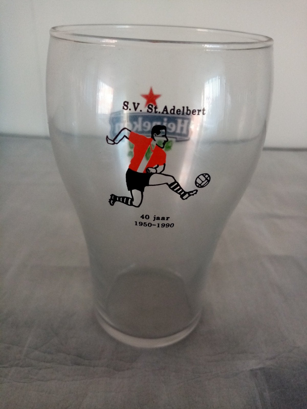 3 Heineken tussen stapelglazen met achteropdruk, Ophalen of Verzenden, Nieuw, Glas of Glazen, Heineken