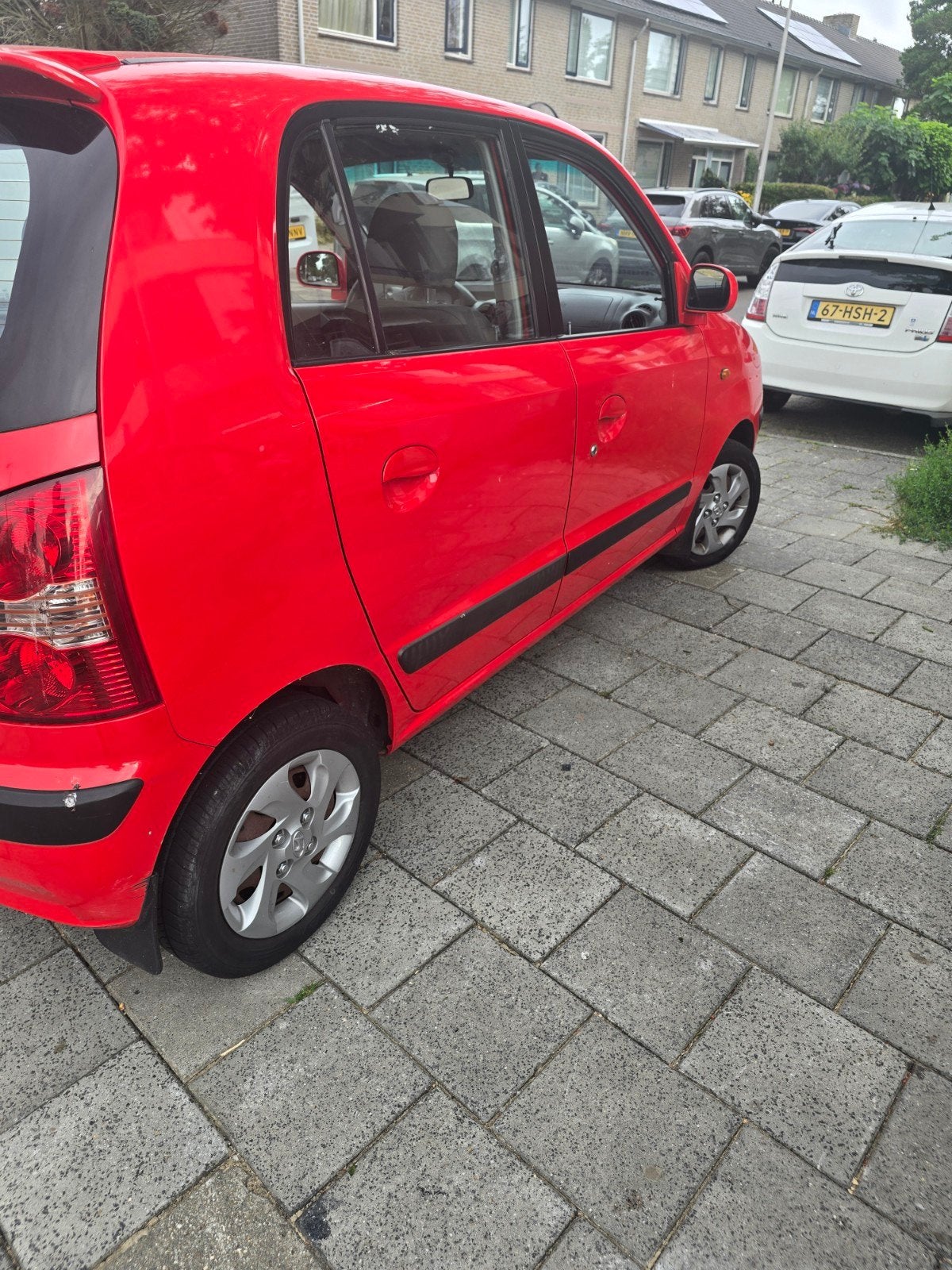 Hyundai Atos 1.1 AUT 2005 Rood, Auto's, Hyundai, 15 km/l, 31 €/maand, 4 cilinders, Origineel Nederlands