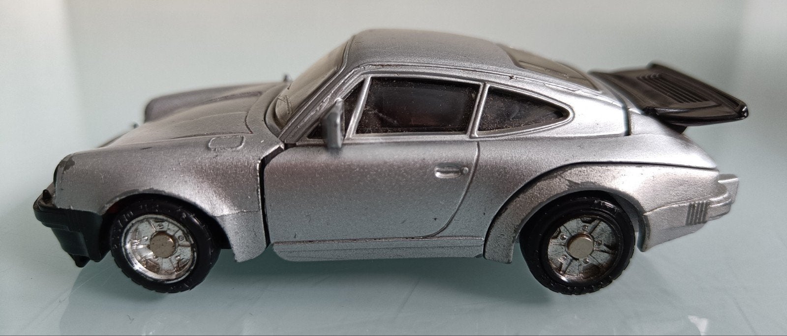 Vintage Bandai Schalerobo Porsche 930 Turbo Transformer, G1, Ophalen of Verzenden, Gebruikt, Autobots