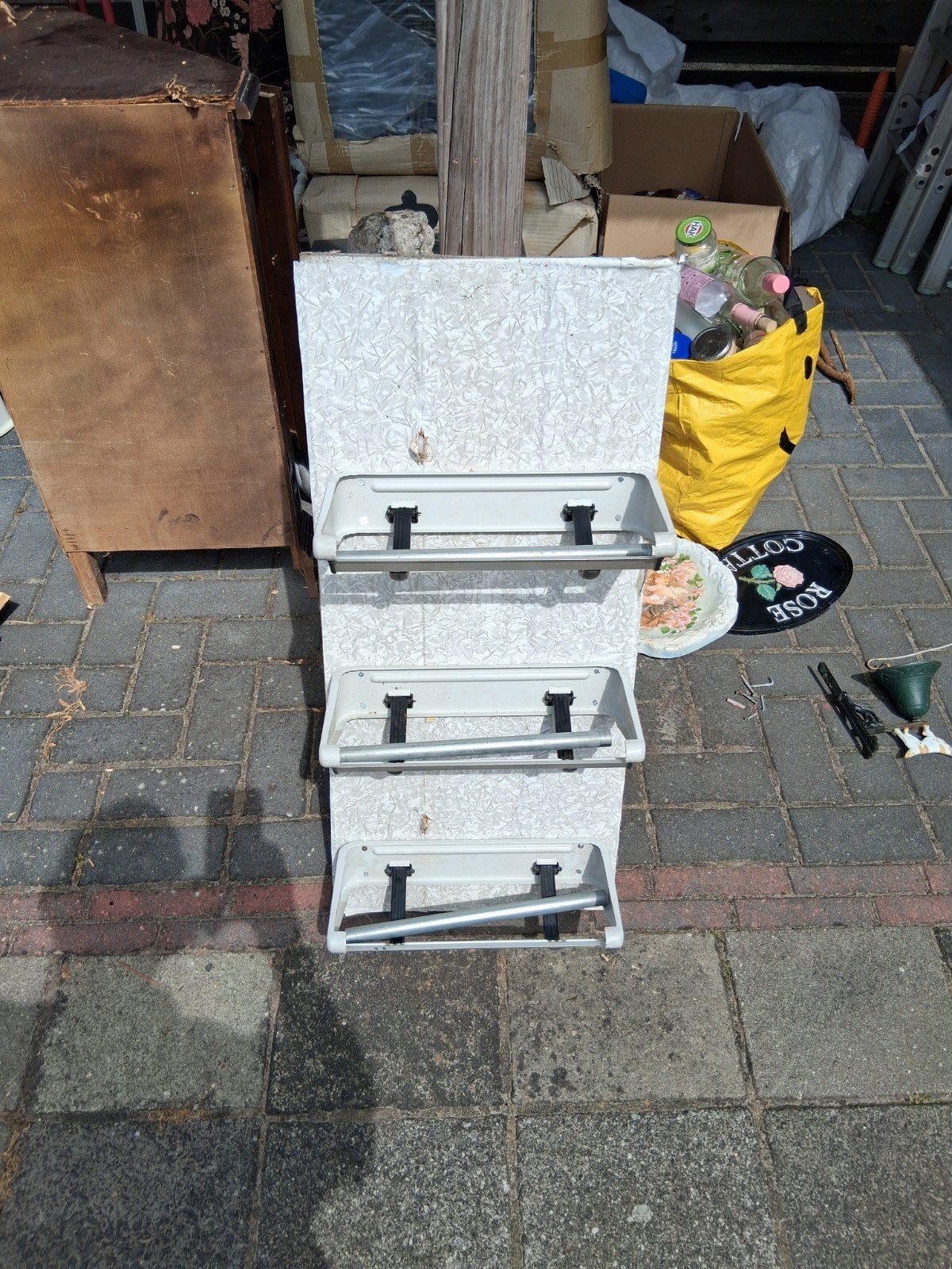 wand met 3 smalle papierrolhouders, Ophalen