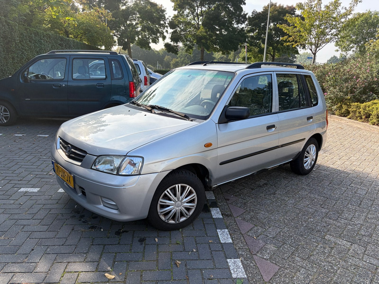 Mazda Demio 1.5 Touring AUT 2002 Grijs, Auto's, Origineel Nederlands, Grijs, Particulier, 900 kg