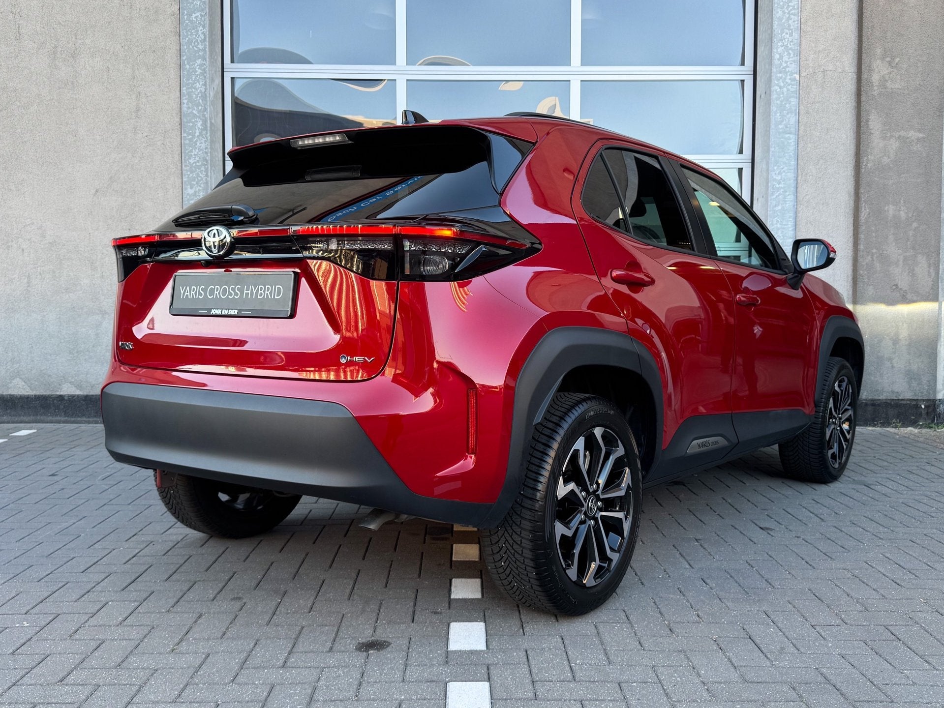 Toyota Yaris Cross 1.5 Hybrid 115 Dynamic|Apple CarPlay/Andr, Auto's, Toyota, 12 maanden, Stof, Gebruikt, Zwart