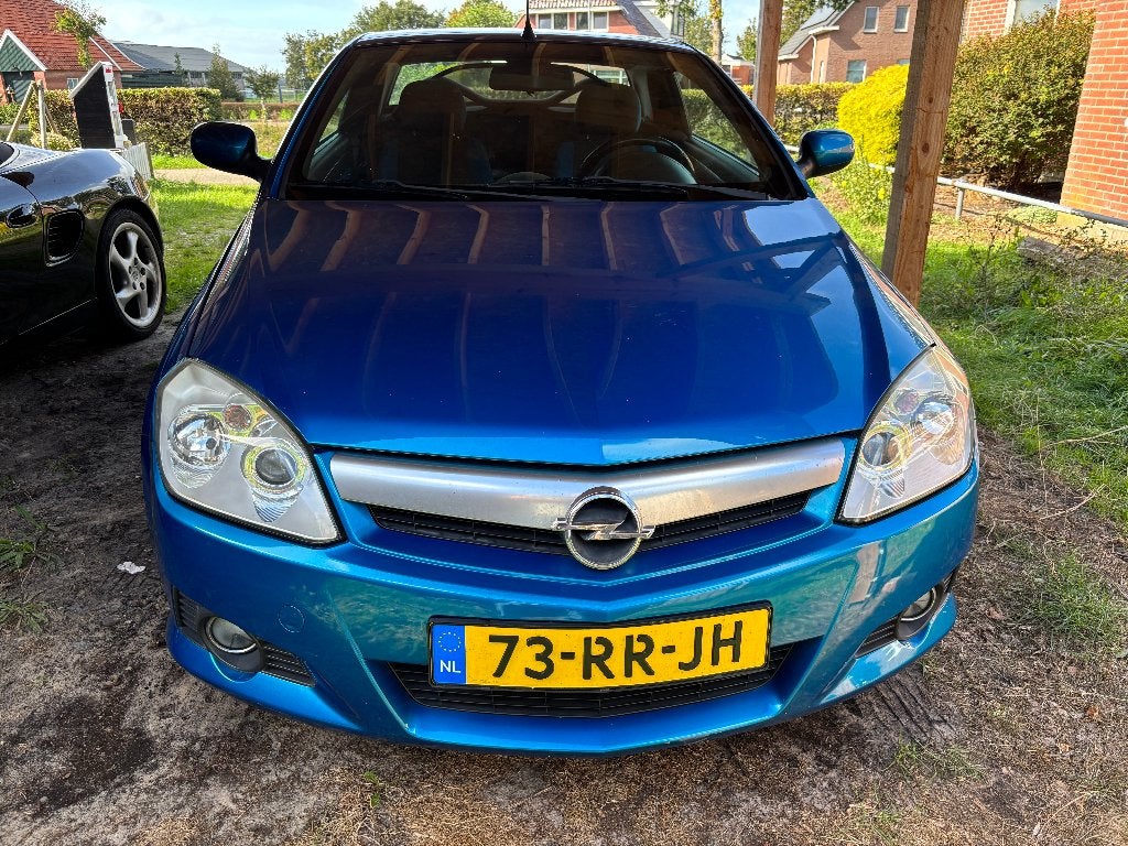 Opel Tigra 1.8 16V Twintop 2005 Blauw (APK 4-2027), Auto's, 4 cilinders, Blauw, 1796 cc, Origineel Nederlands