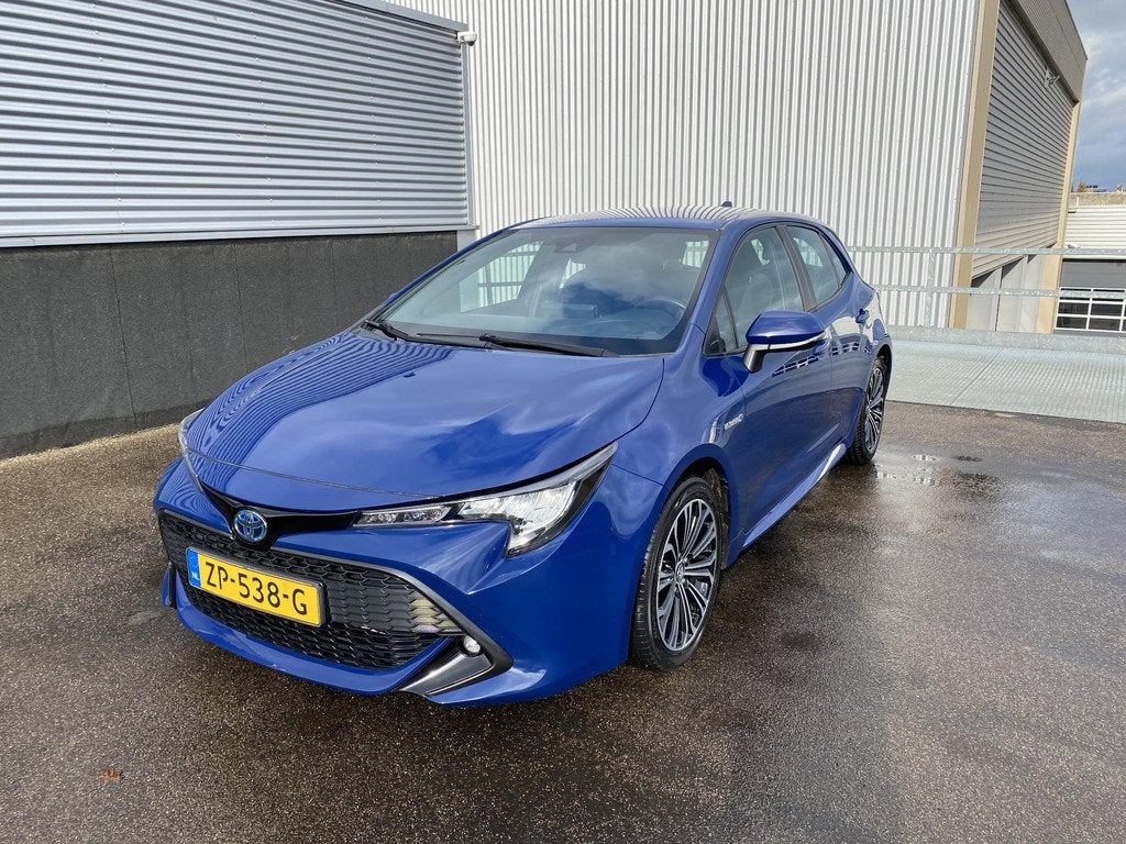 Toyota Corolla 1.8 Hybrid First Edition Trekhaak, navigatie,, Gebruikt, 4 cilinders, Blauw, Corolla