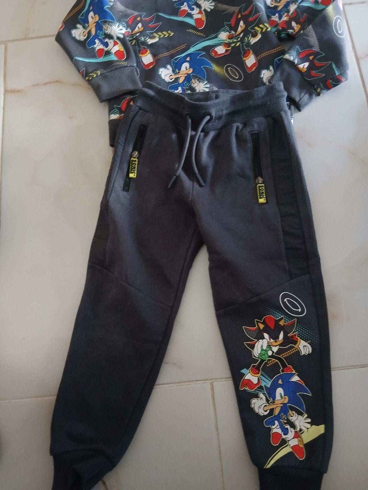 sonic joggings pak, Ophalen of Verzenden, Zo goed als nieuw, Maat 104