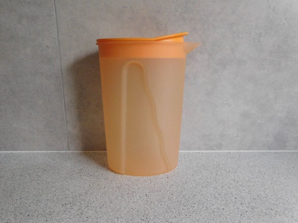 Tupperware Trendy Schenkkan 1 Ltr. Oranje, Ophalen of Verzenden, Zo goed als nieuw, Oranje, Beker of Kan