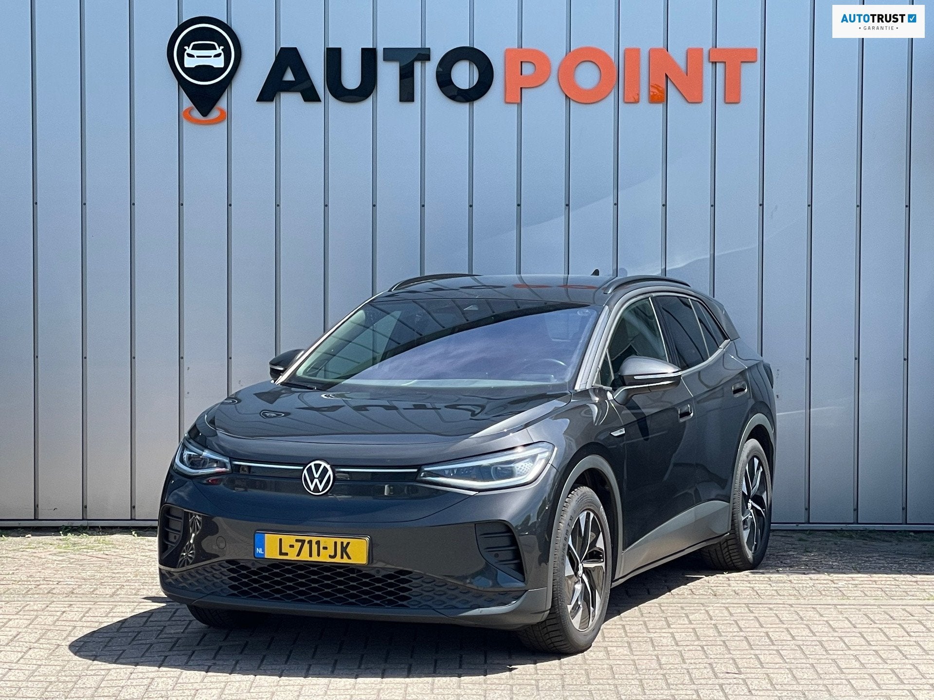 Volkswagen ID.4 Business 77 kWh 1E EIG ORG NL DEALEROND FASE, Auto's, Automaat, Achterwielaandrijving, Gebruikt, Grijs
