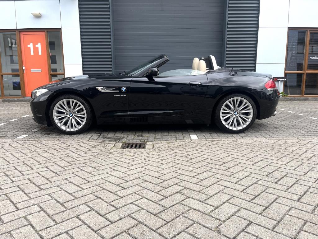 BMW Z4 2.5 Roadster Sdrive 23I AUT 2009 Zwart, Auto's, BMW, Automaat, Achterwielaandrijving, Beige, 2497 cc