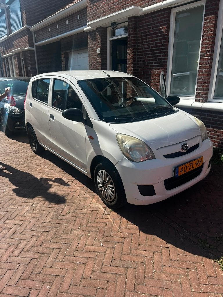 Daihatsu Cuore 1.0 5D 2008 Wit Nieuwe APK tot 08-2027, Auto's, Daihatsu, Voorwielaandrijving, Stof, 600 kg, 18 €/maand