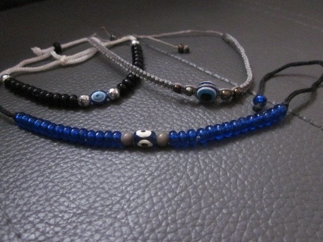 3 armbandjes met oog van fatima, Ophalen, Zo goed als nieuw, Zwart, Kunststof of Plastic