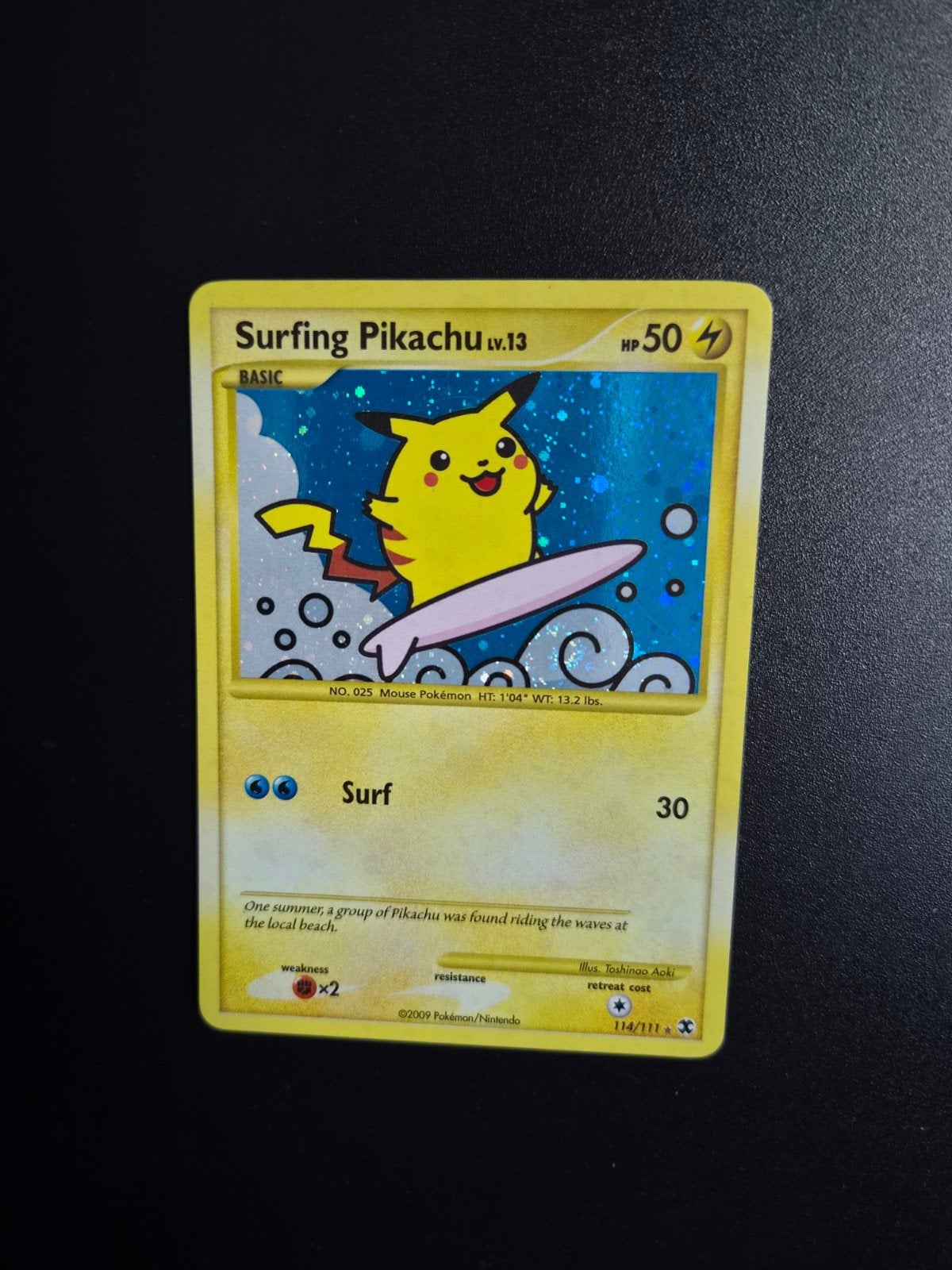 Surfing Pikachu 114 Pokemon Rising Rivals holo, Ophalen of Verzenden, Zo goed als nieuw, Booster, Foil