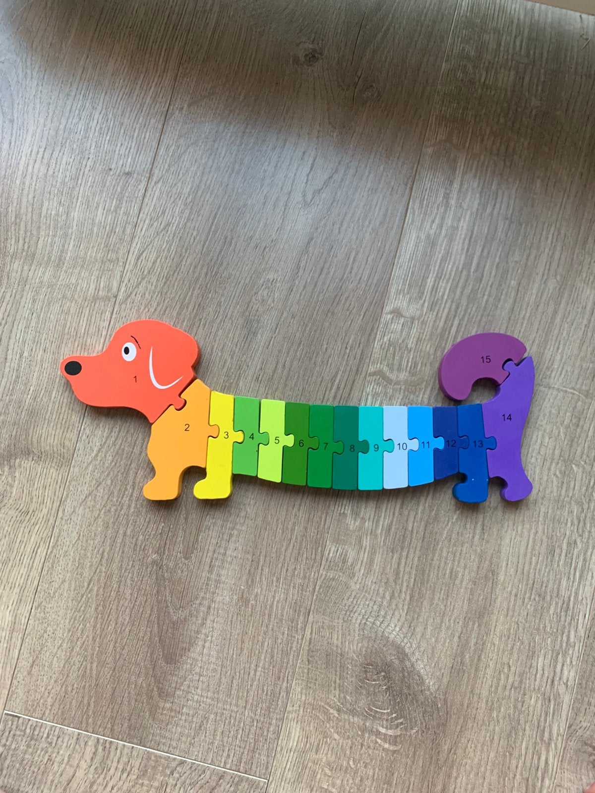 Houten puzzel teckel / hond 15 stukken, Gebruikt, 10 tot 50 stukjes, Ophalen of Verzenden, Van hout