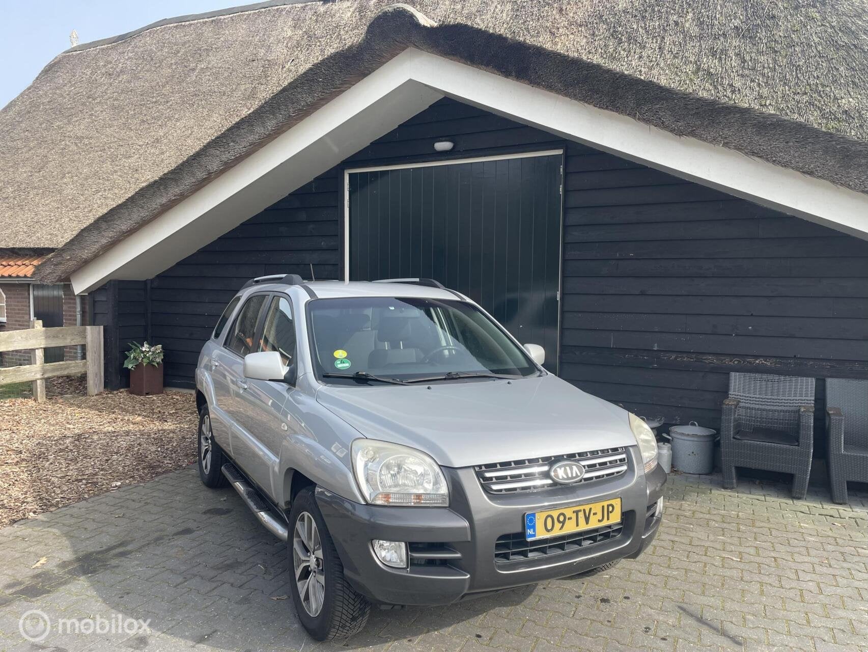 Kia Sportage 2.0 CVVT Comfort, Airco, Cruiscontrol, 1442 kg, Stof, Gebruikt, Zwart
