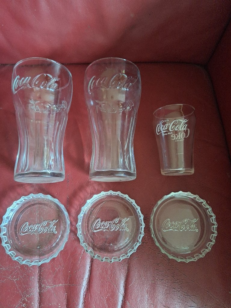 Coca-Cola glazen 0,5 L en onderzetters, Ophalen of Verzenden, Zo goed als nieuw, Gebruiksvoorwerp