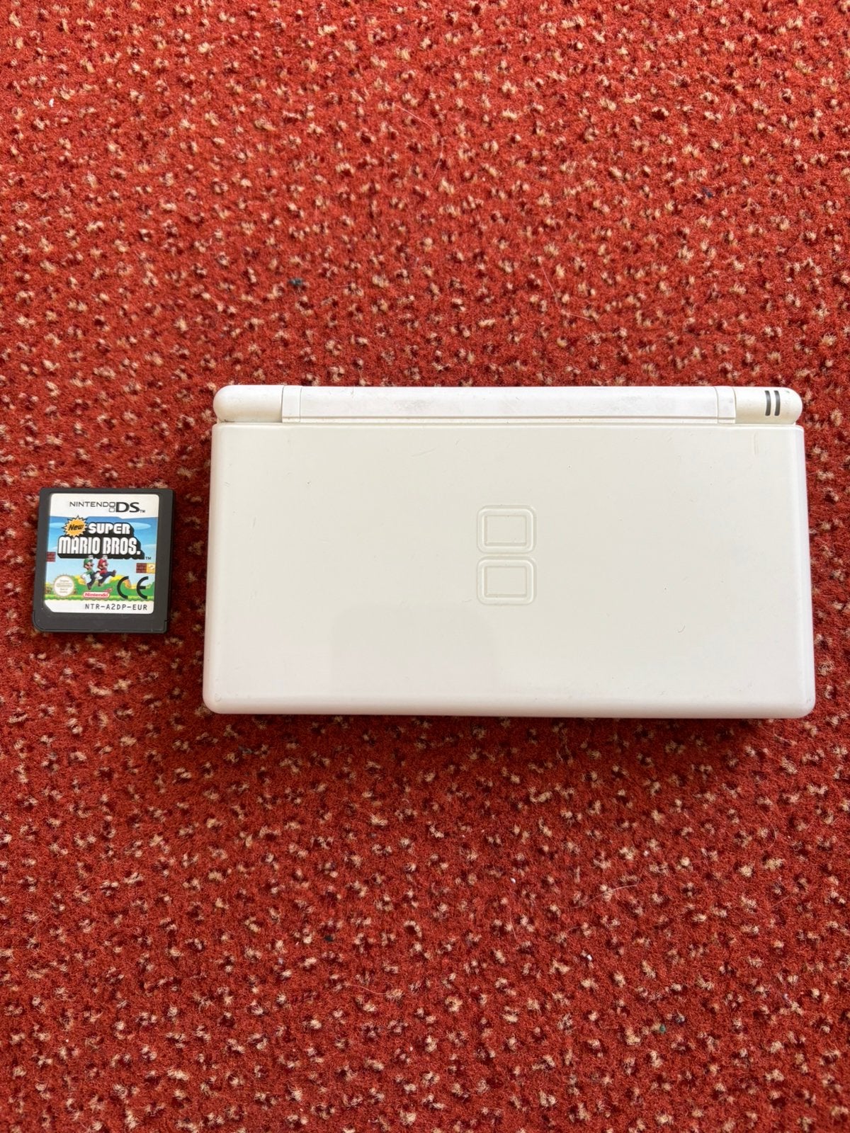 Nintendo DS lite met New Super Mario Bros, Ophalen of Verzenden, Zo goed als nieuw, Wit, DS Lite