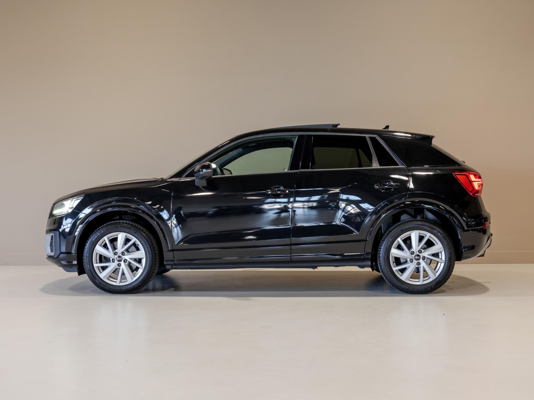 Audi Q2 1.4 TFSI CoD Design Pro Line Plus 150pk / Panoramada, Auto's, Gebruikt, 4 cilinders, Automatische klimaatregeling, Zwart