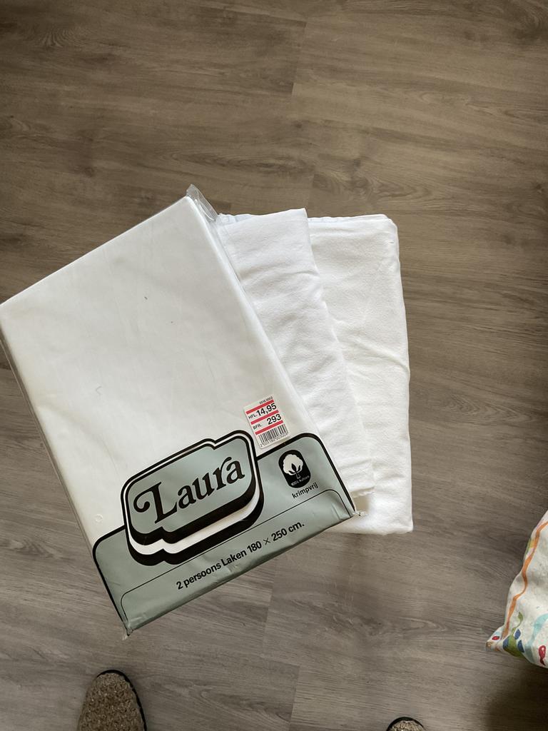 Lakens voor bed, Ophalen, Zo goed als nieuw