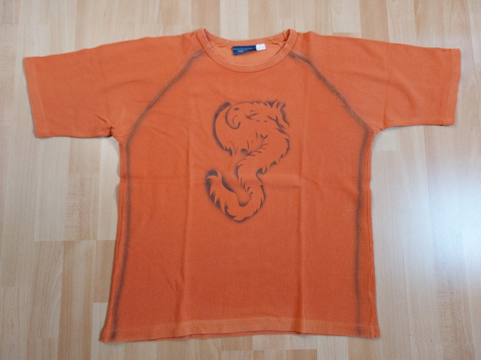 Oranje t-shirt *Draak*, Maat 52/54 (L), Casual Clothes Compagny, Oranje, Ophalen of Verzenden