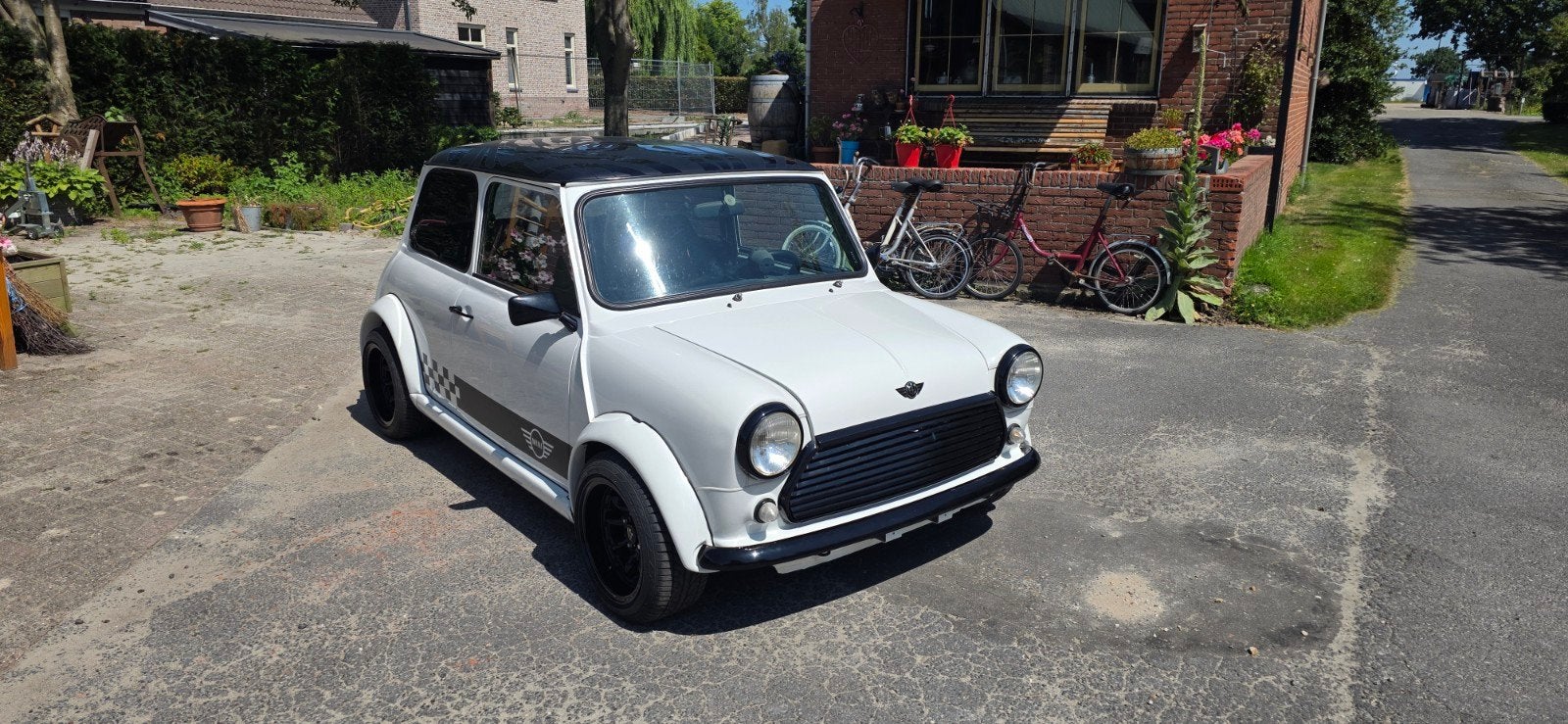Mini 1000 1.0 E 1983 Blauw, Auto's, Voorwielaandrijving, Zwart, Blauw, Leder en Stof