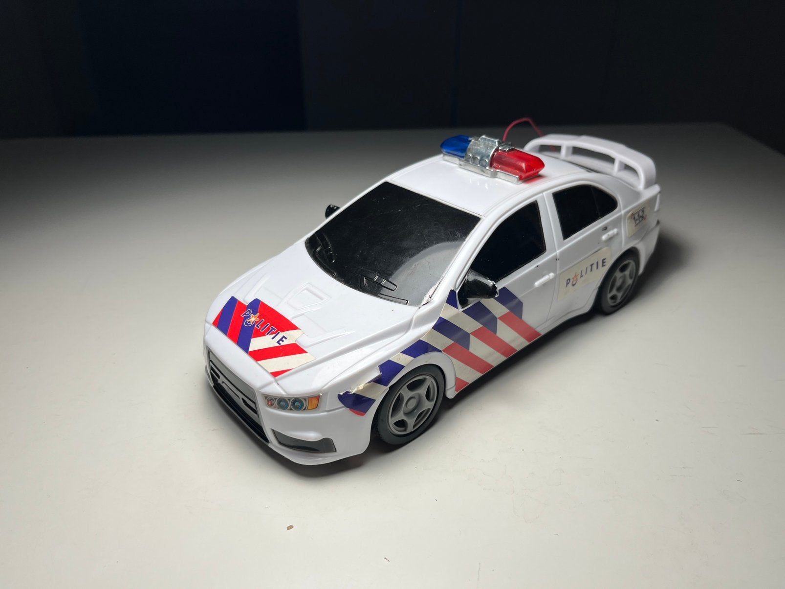 Merkloos - Mitsubishi Lancer Evo Politie ex rc - 1:24, Verzenden, Gebruikt, Auto, Overige merken