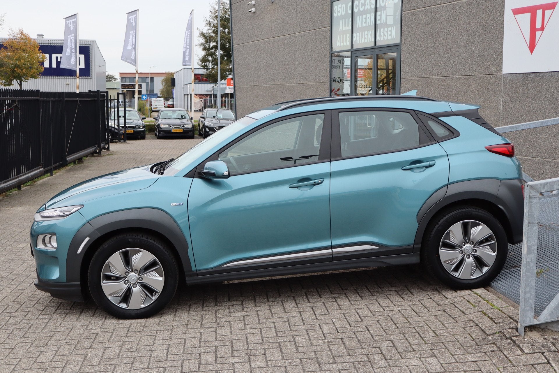 Hyundai KONA EV Comfort Smart 64 kWh Nederlandse auto/Apple, Auto's, 12 maanden, Stof, Gebruikt, Zwart