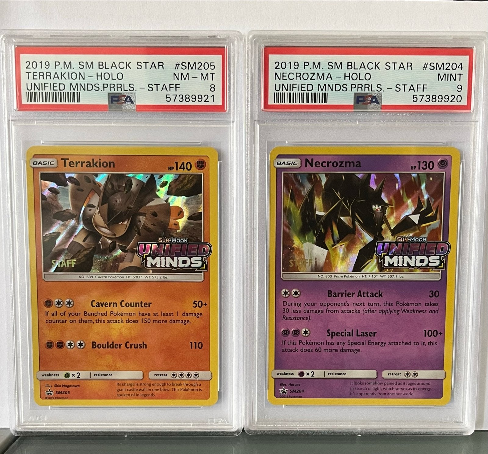 PSA 8 & 9 Pokemon kaarten: Terrakion & Necrozma Holo Staff, Hobby en Vrije tijd, Verzamelkaartspellen | Pokémon, Ophalen of Verzenden