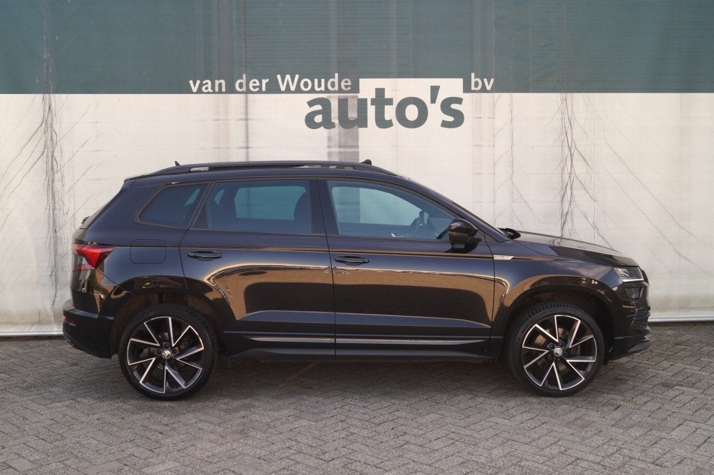 Skoda Karoq 1.5 TSI 150pk DSG Sportline Business -PANO-ECC-N, Auto's, Skoda, Automaat, Stof, 4 cilinders, 150 pk