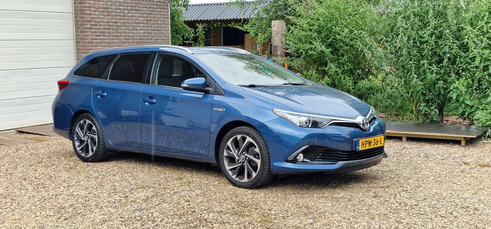 Toyota Auris 1.8 Hybrid Touring Sports CVT 2015 Blauw, Euro 5, Stof, Automatische klimaatregeling, Blauw