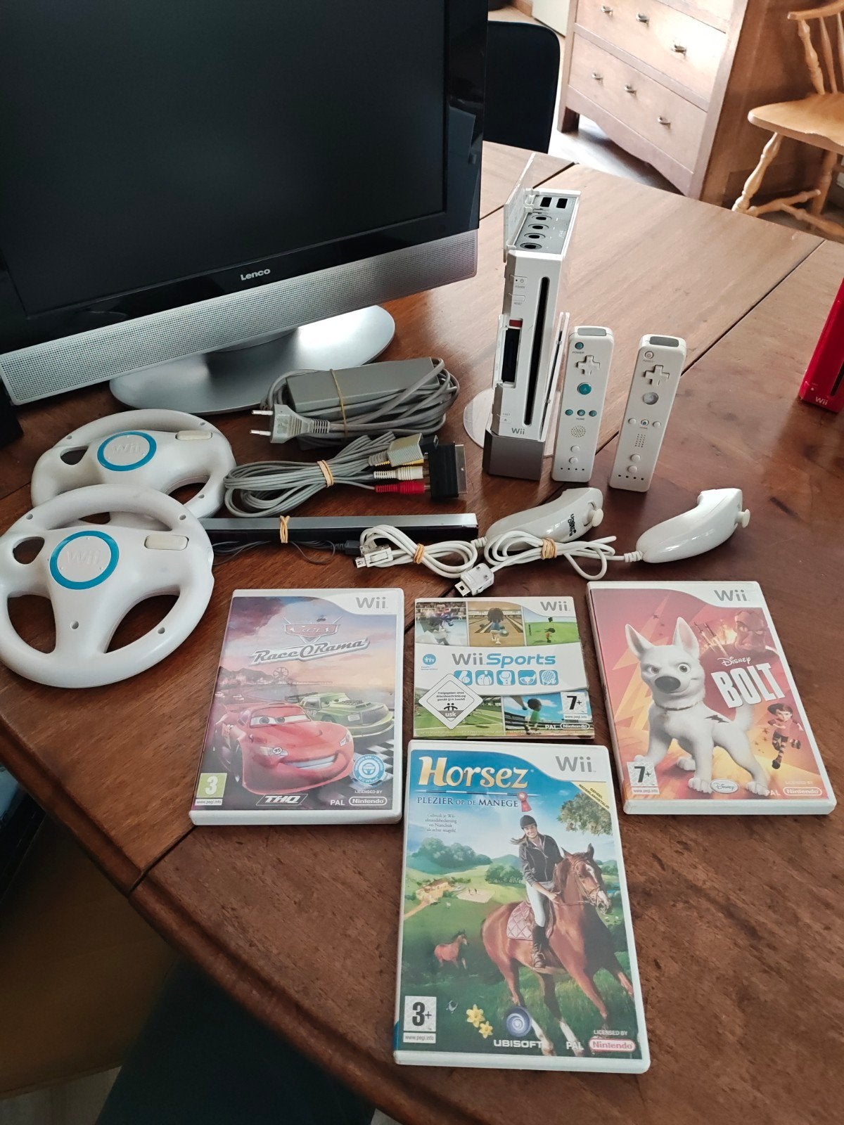 Nintendo Wii sports editie met games., Ophalen of Verzenden, Gebruikt, Met 2 controllers, Met stuurtje