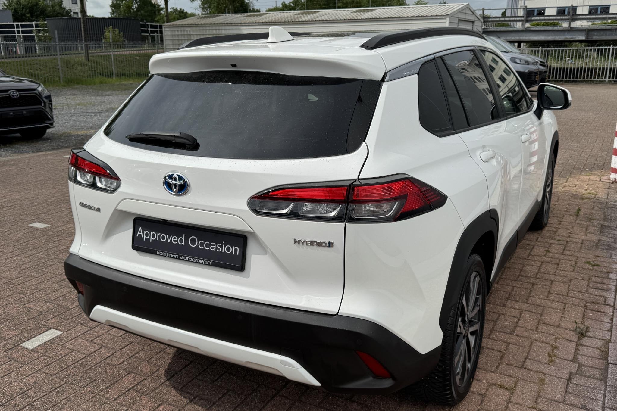 Toyota Corolla Cross Hybrid 140 Premium Pack II / Panoramada, Auto's, Gebruikt, 4 cilinders, Leder en Stof, Wit