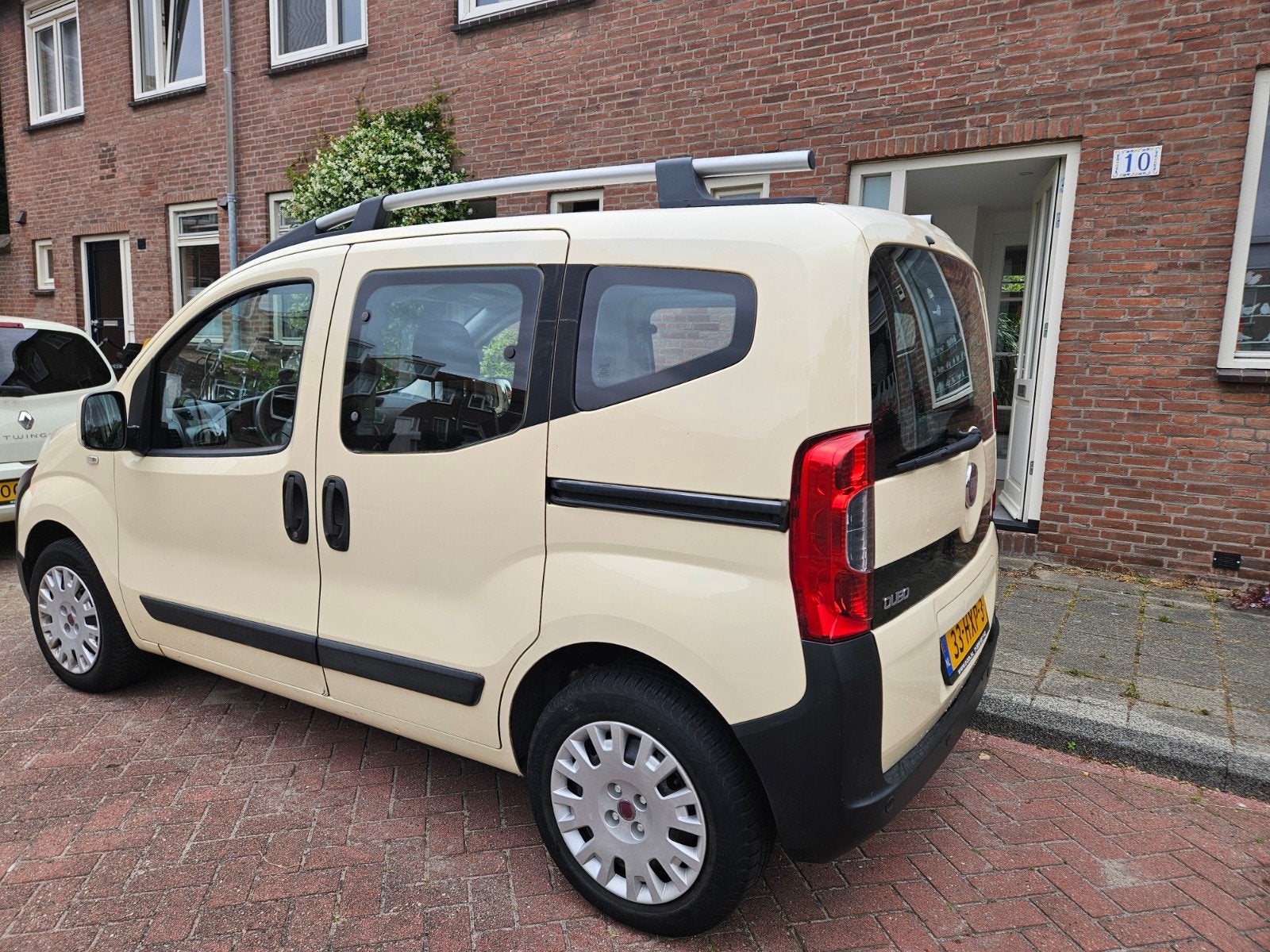 Fiat Qubo 1.4 2009 Wit. Ruim, praktisch en veelzijdig., Auto's, Voorwielaandrijving, 400 kg, Wit, Origineel Nederlands