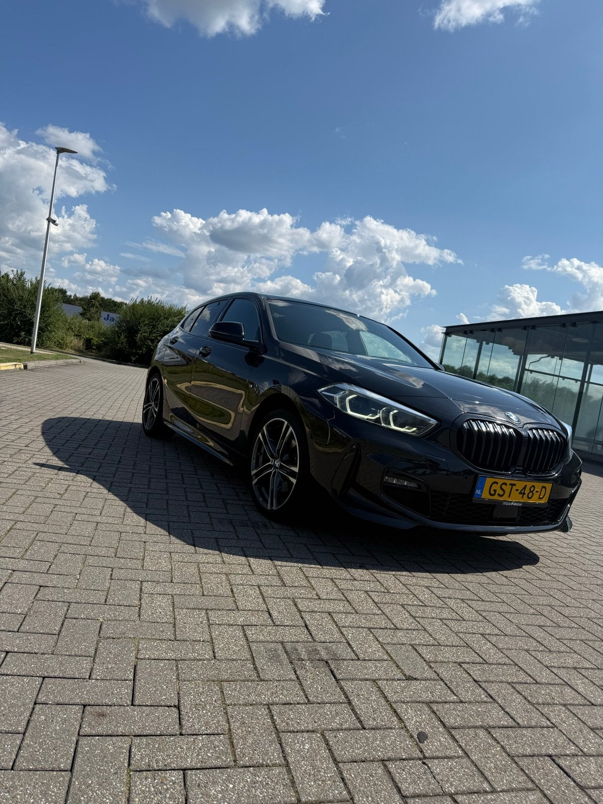 BMW 1-Serie 118i 136pk Aut 2022 Zwart, Auto's, 136 pk, Leder en Stof, Zwart, Particulier