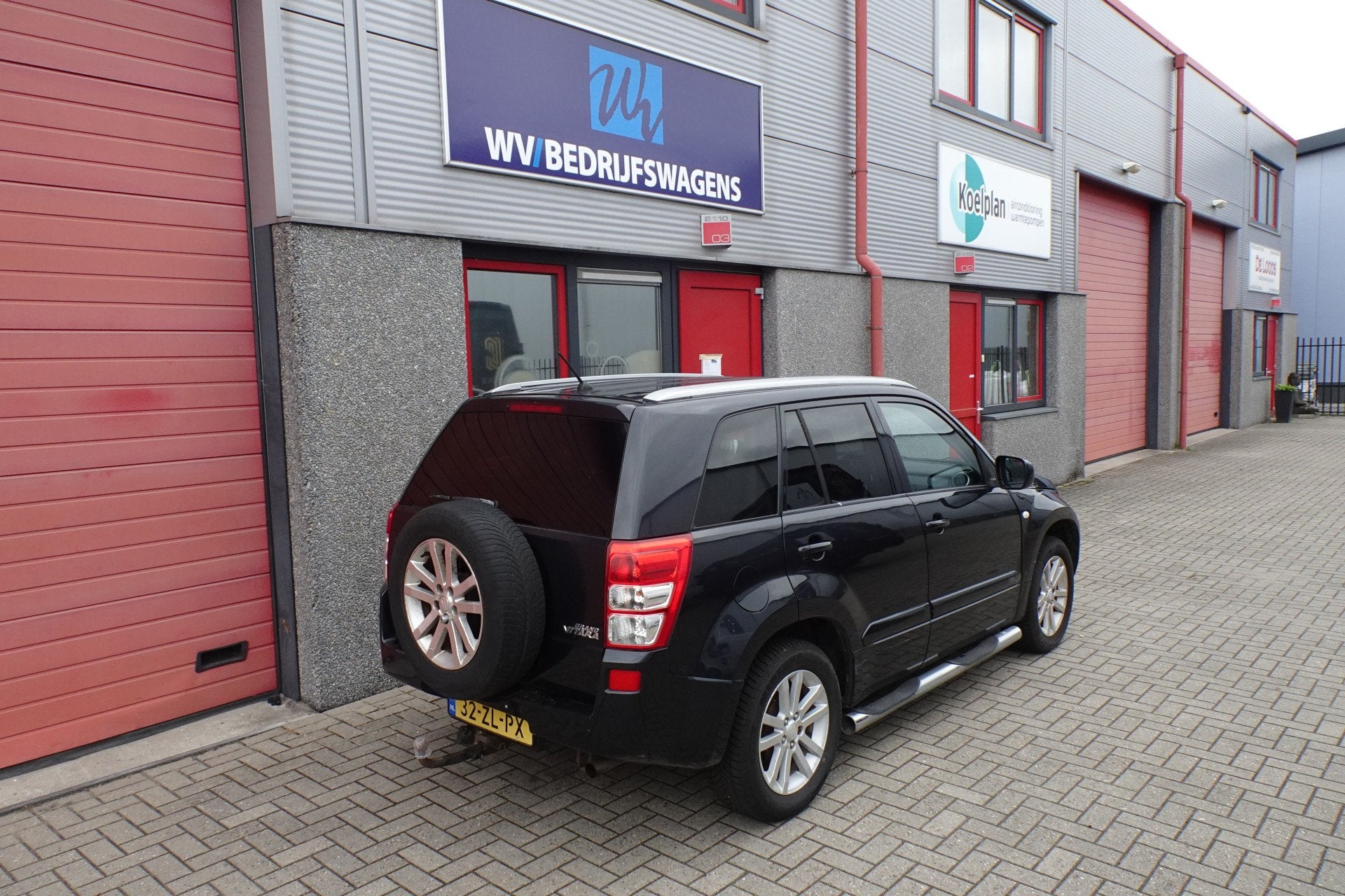 Suzuki Grand Vitara 2.0-16V Limited leer lmv sidebars, Auto's, Suzuki, Zwart, 4 cilinders, 1850 kg, Grand Vitara