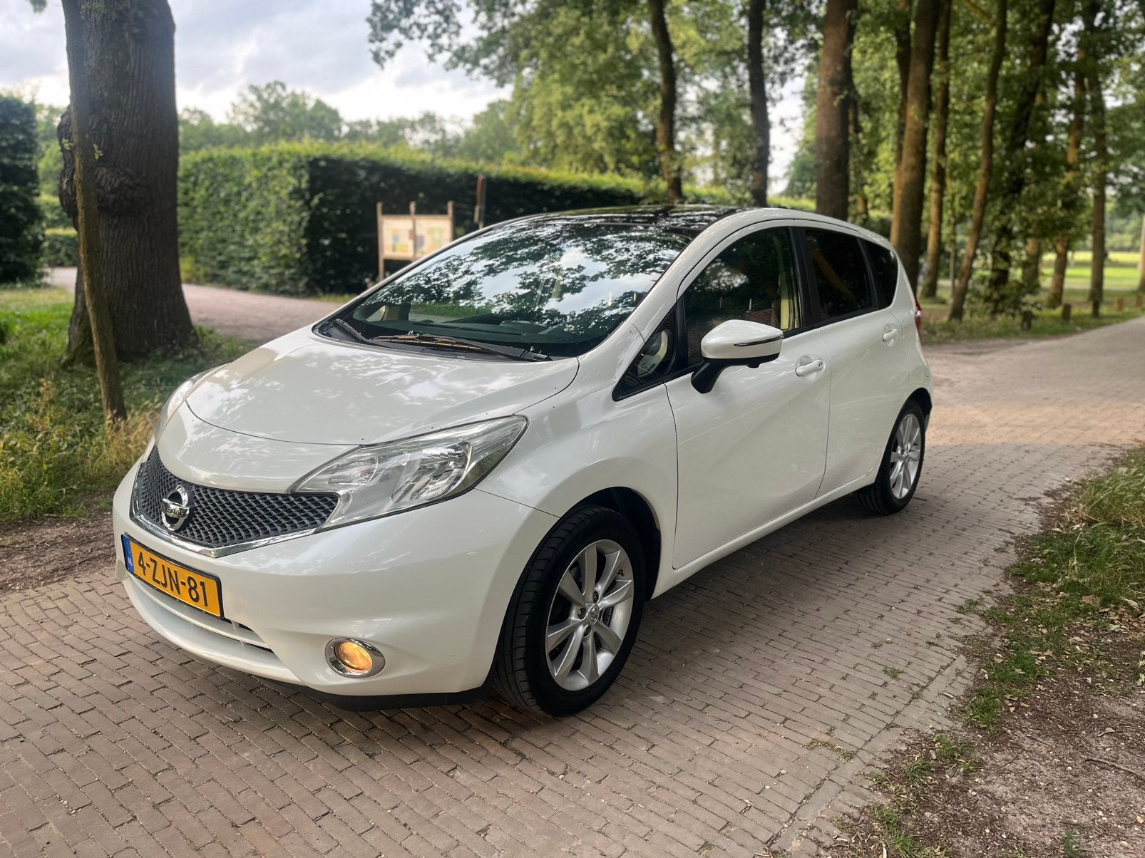 Nissan Note 1.2 Dig-s 72KW/98PK 2015 Wit, Auto's, Nissan, Voorwielaandrijving, 1025 kg, Handgeschakeld, Particulier