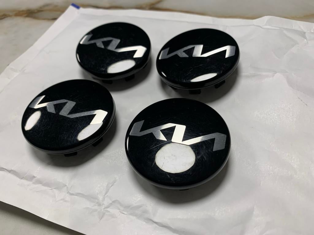 4x Kia naafdoppen, 55mm, Gebruikt, Velg(en), Ophalen of Verzenden, Zomerbanden