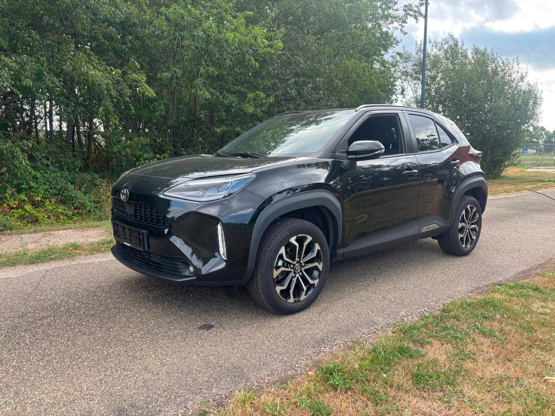 Toyota Yaris Cross 1.5 Hybrid 115 Dynamic zeer luxe, Dealer onderhouden, Stof, Gebruikt, Zwart