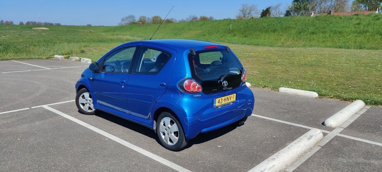 Toyota Aygo 1.0 12V Vvt-i 5DRS 2009 Blauw 78.000 km, Voorwielaandrijving, 68 pk, Origineel Nederlands, Bedrijf