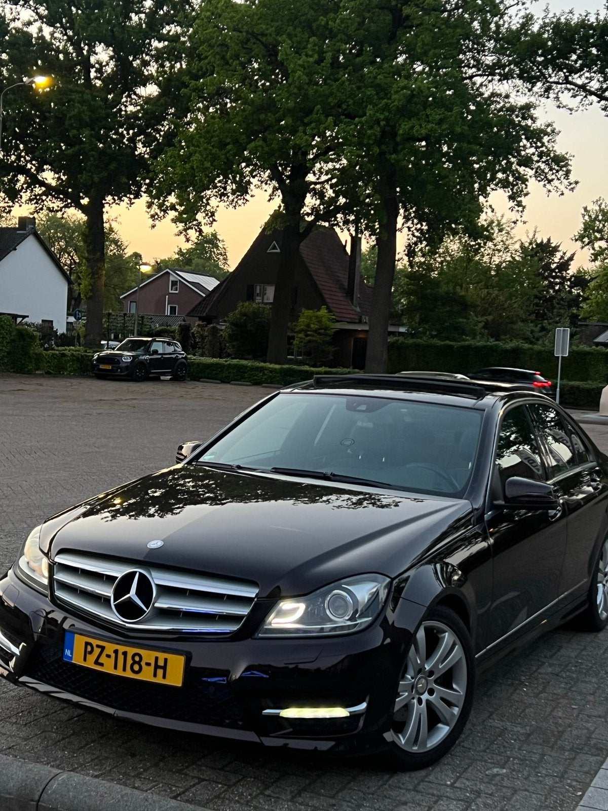 Mercedes-Benz C-Klasse C180 BE Aut7 2011 Bruin, Automaat, Achterwielaandrijving, 1800 kg, Zwart
