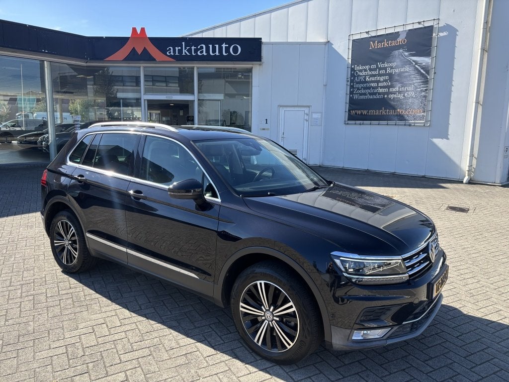 Volkswagen Tiguan 2.0 TSI 4Motion Highline Trekhaak Camera C, Auto's, Automaat, Dealer onderhouden, Gebruikt, 4 cilinders
