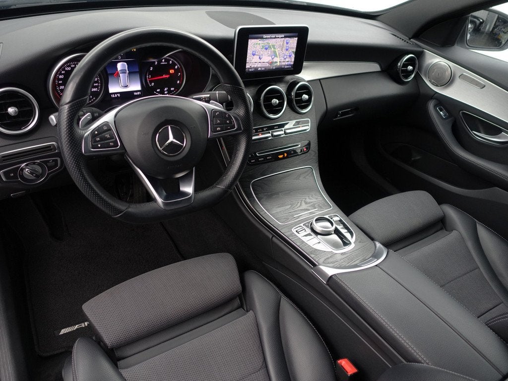 Mercedes-Benz C-Klasse Estate 180 AMG Night Edition Aut- Pan, Auto's, Mercedes-Benz, Automaat, Achterwielaandrijving, Met garantie (alle)