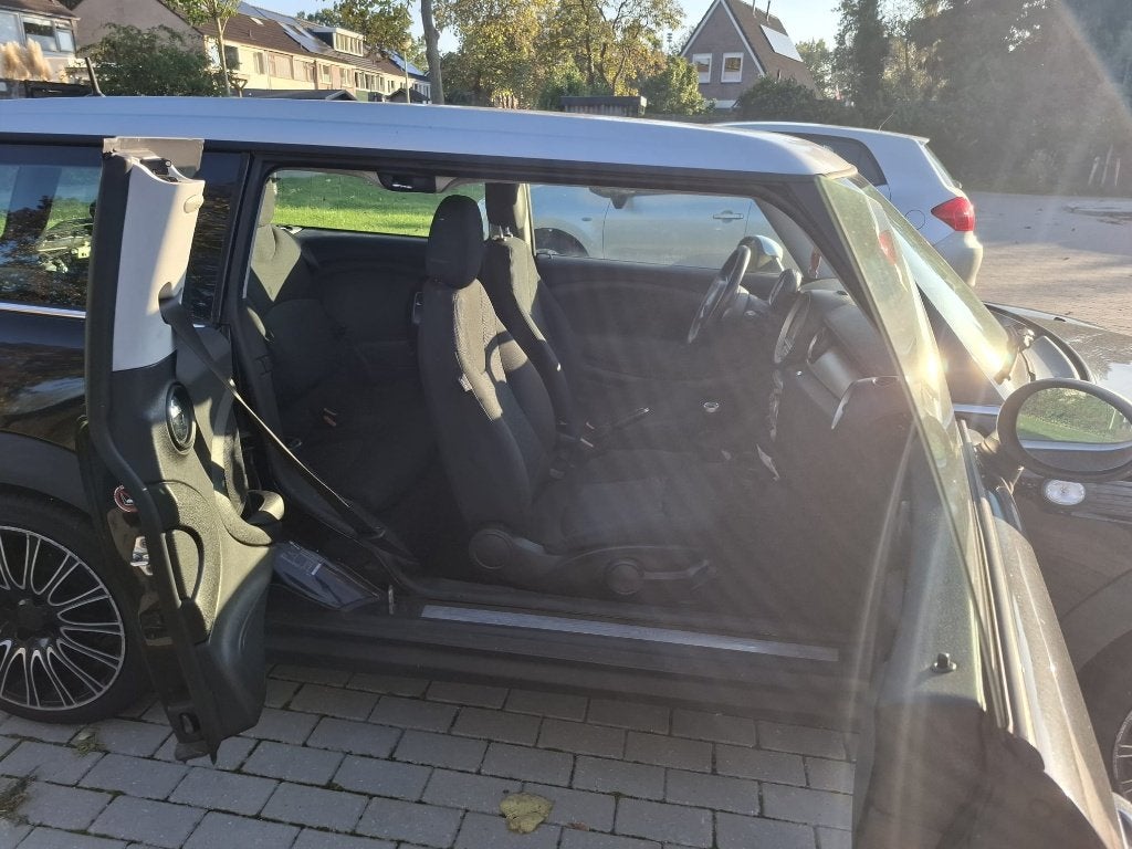 Mini Clubman 1.6 D Cooper 2009 Zwart, Auto's, Voorwielaandrijving, Stof, 4 cilinders, 4 stoelen