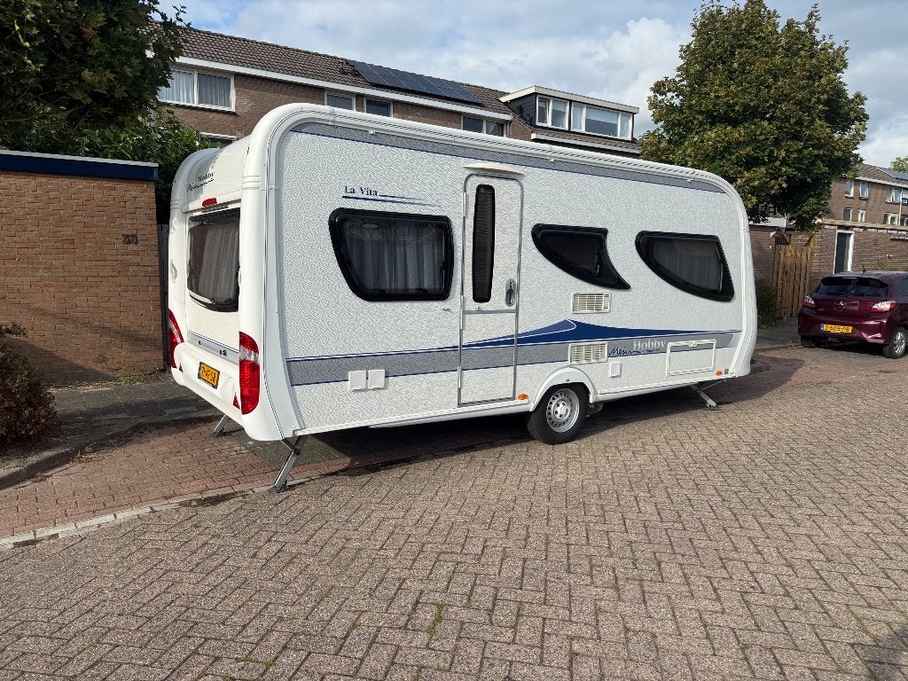 hobby La Vita Bionda 495 UL 2009 + Mover + voortent + luifel, Caravans en Kamperen, Caravans, 2 aparte bedden, Rondzit, Hobby