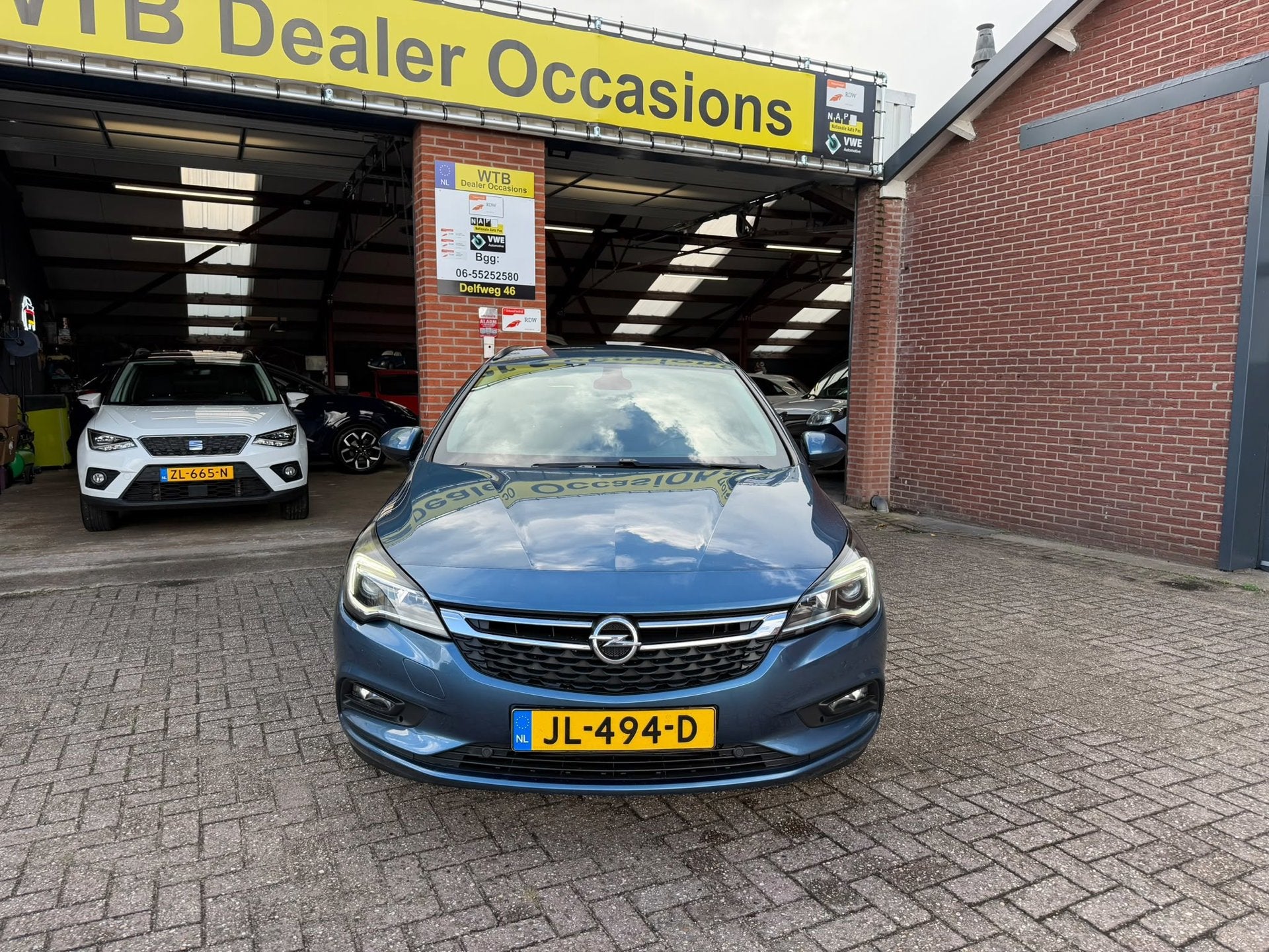 Opel Astra Sports Tourer 1.0 Edition, Navi, Airco Dealer oh,, Auto's, Opel, Voorwielaandrijving, Gebruikt, 1178 kg, Blauw