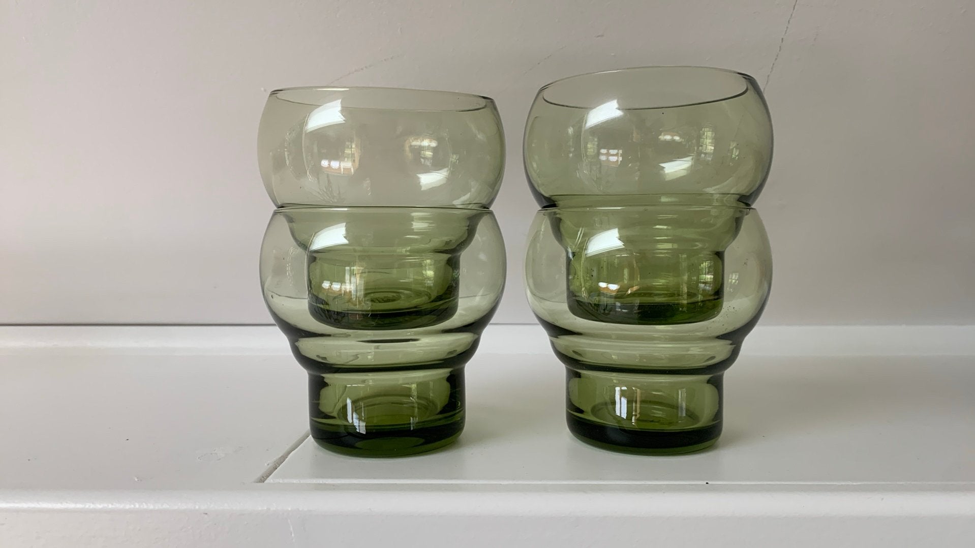 Vier groene glazen HKliiving HK living zgan, Ophalen, Glas of Glazen, Vintage, Glas